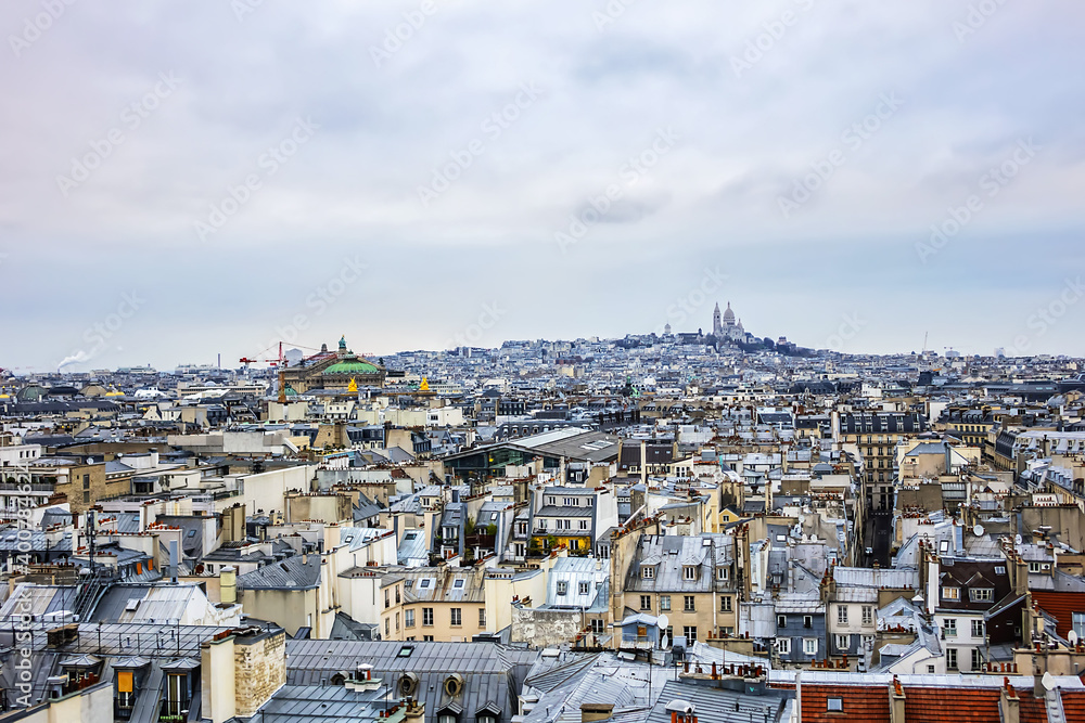 Paris Panorama. Montmartre hill with Sacre-Coeur Cathedral in the background. Paris, France.