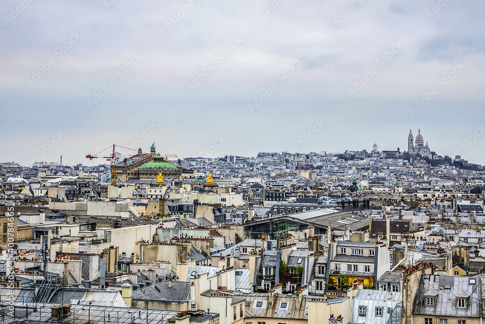 Paris Panorama. Montmartre hill with Sacre-Coeur Cathedral in the background. Paris, France.