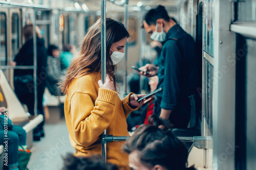 variety of passengers ride the subway car © yurolaitsalbert