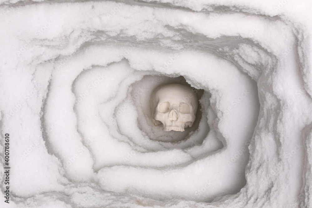 Fototapeta premium halloween human skull in ice cave