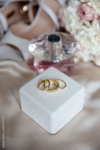 wedding rings bouquet bride