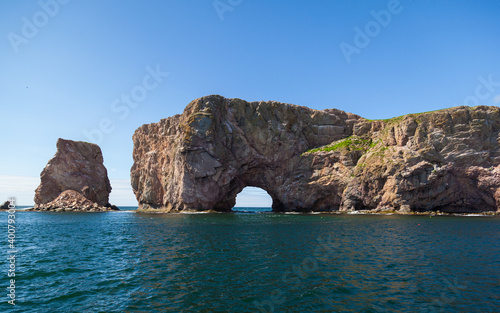 Perce Rock, Perce, Gaspe, Peninsula, Quebec, Canada Perce Rock is one of the world's largest natural arches located in water.