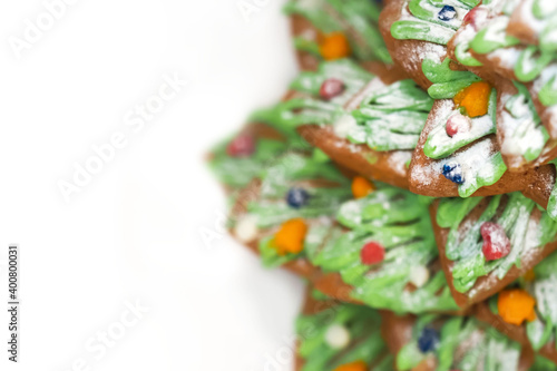Homemade christmas gingerbread spruce isolated on white background, copy space. Gingerbread christmas tree, spruce