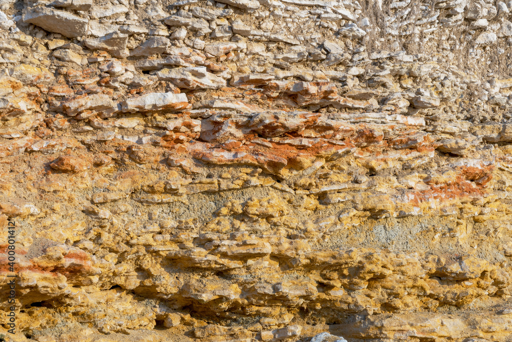 Background of limestone sedimentary rock on the sea coast at daytime Background of limestone sedimentary rock on the sea coast at daytime