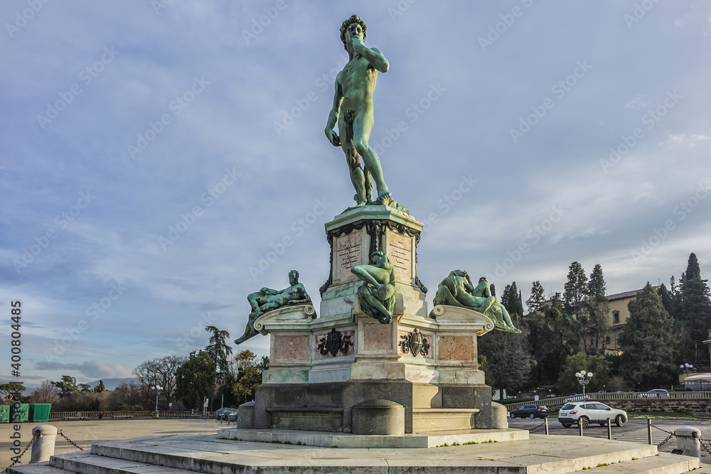 Fototapeta premium Bronze replica of statue David in the center of Michelangelo Square (Piazzale Michelangelo, 1869) in Florence (Firenze). Italy.