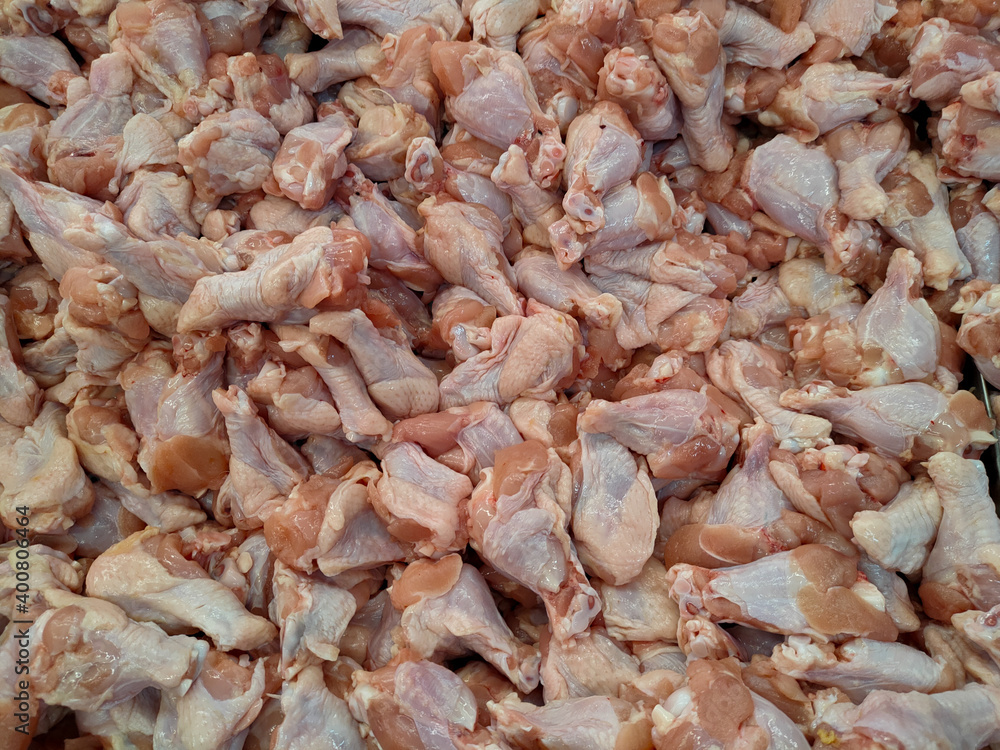 Fresh chicken drumsticks in the market, Raw material food.