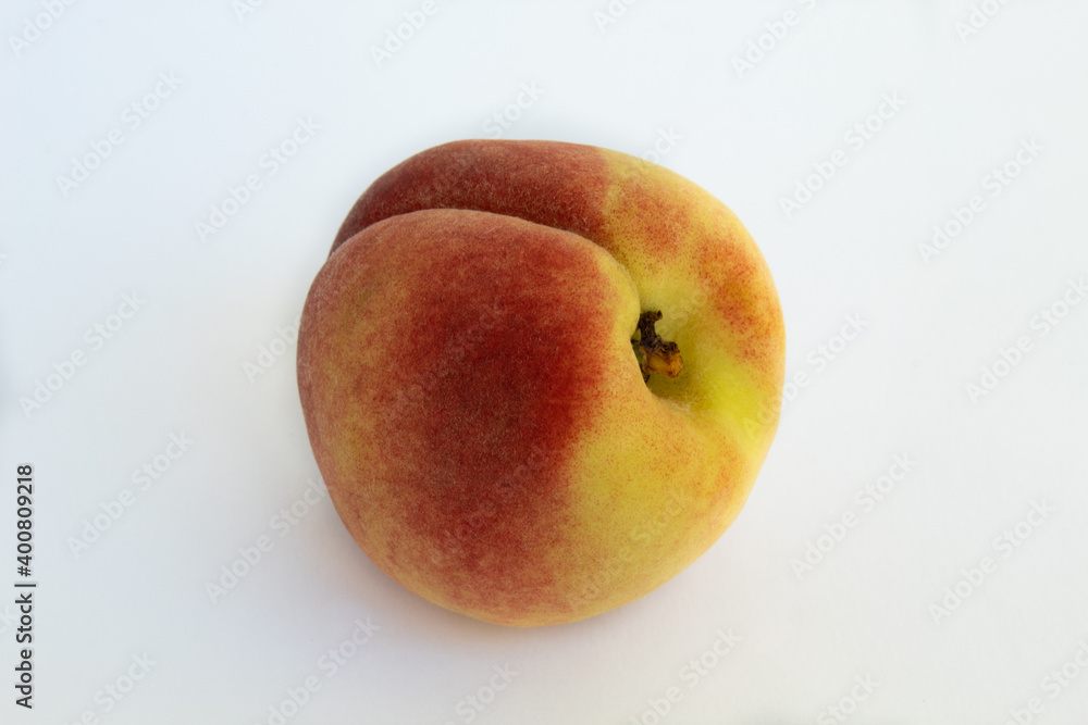 Close up of peach on white background Close up of peach on white background