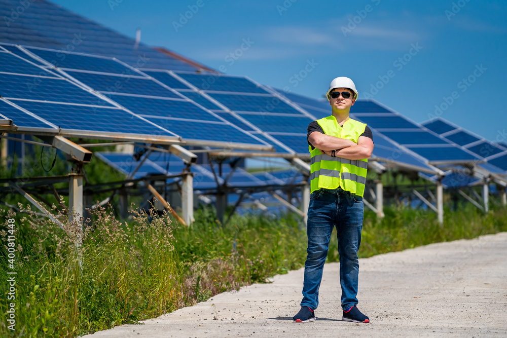 Expertise service worker on measuring efficiency of operation and maintenance at solar plant.