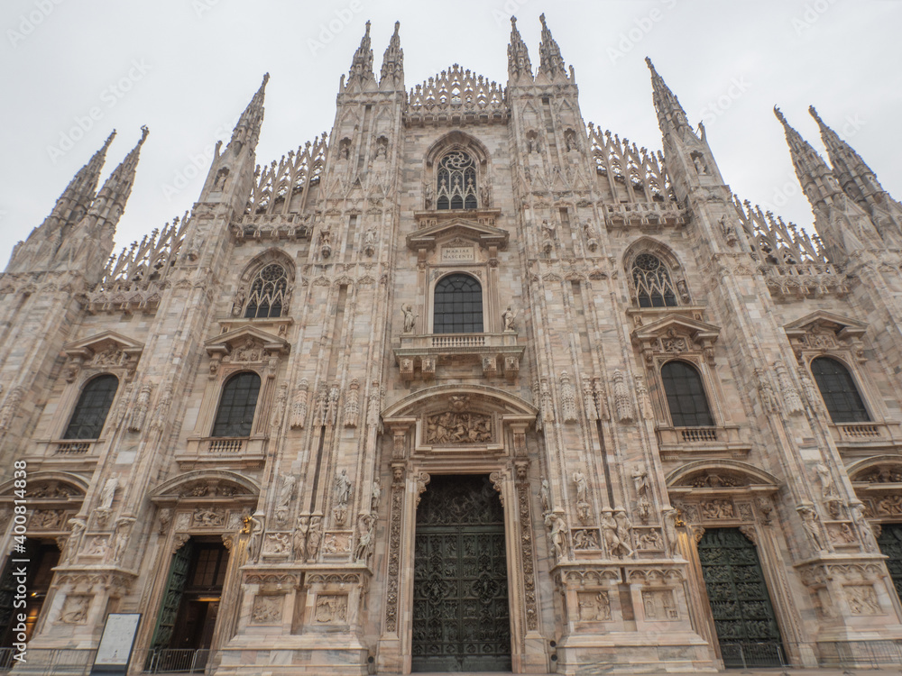 closeup of the facade of the Duomo, stunning gothic cathedral dedicated to the Virgin.Milan, Lombardy, Italy.