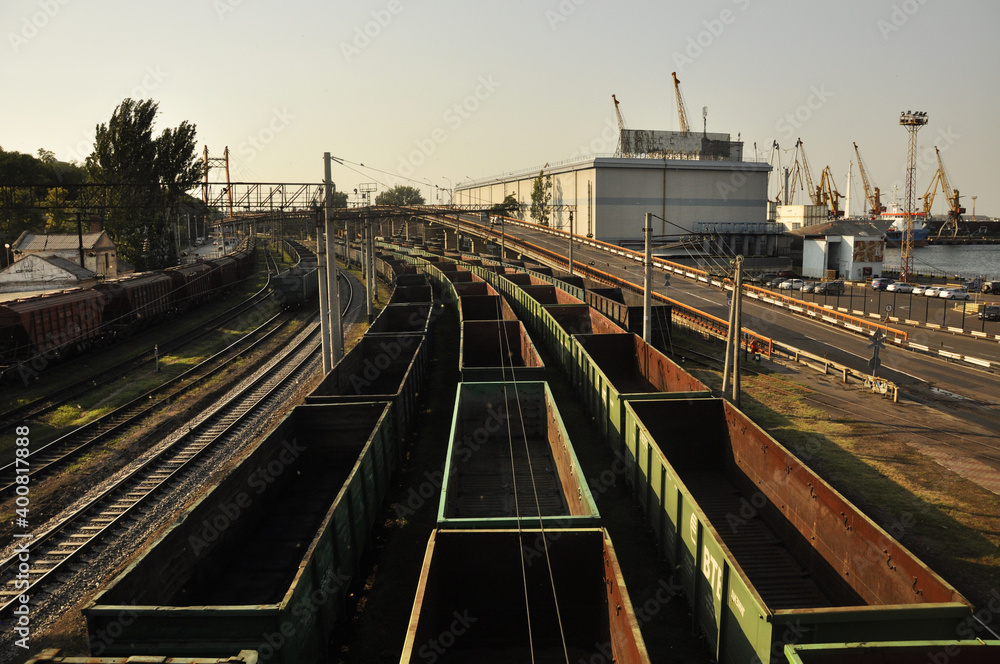 Railway with wagons on rails near the port
