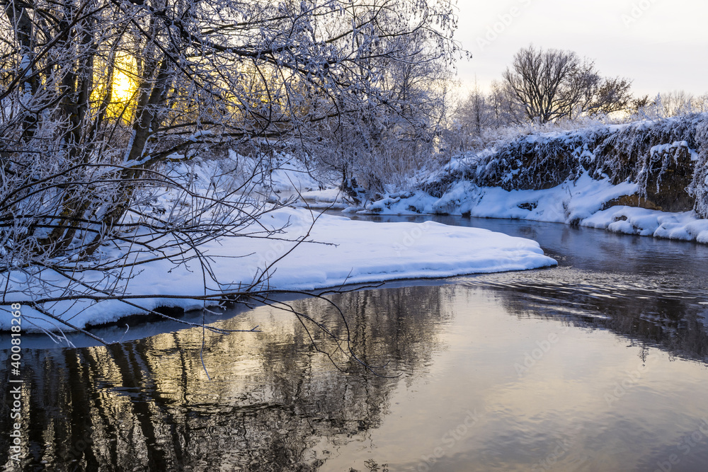 Winter river in the twilight light. Winter river in the twilight light.
