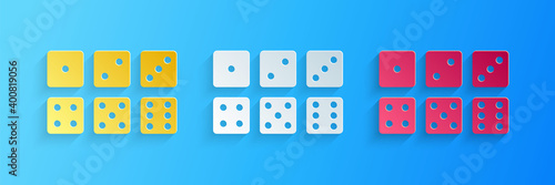 Paper cut Set of six dices icon isolated on blue background. Paper art style. Vector.