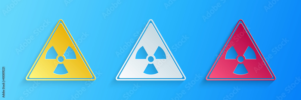 Paper cut Triangle sign with radiation symbol icon isolated on blue background. Paper art style. Vector. Paper cut Triangle sign with radiation symbol icon isolated on blue background. Paper art style. Vector.