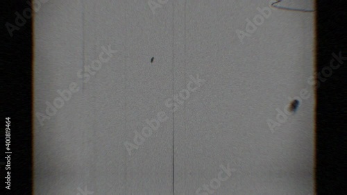 Film noise and grain dynamic flickering texture. Black frame vignette. Dust, dirt, scratches, hair, other artifacts. Film burn vintage effect. Analog retro footage. 35 mm, 8 mm strip. 4K Reel clutter 