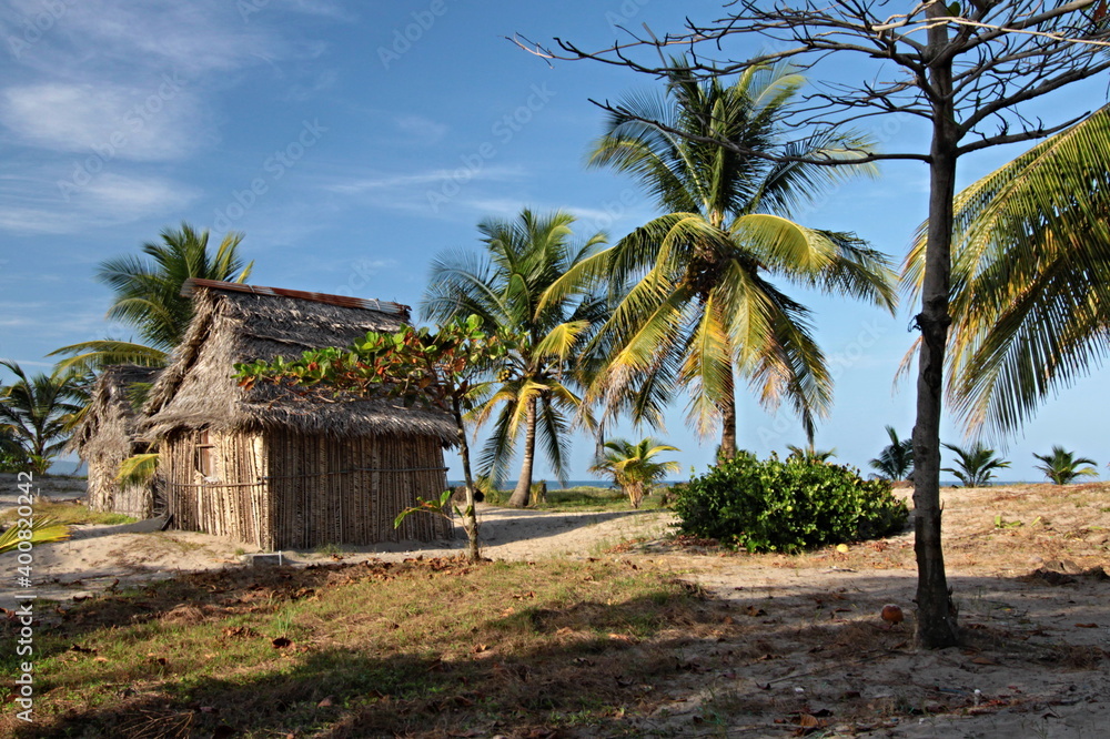 Obraz premium Dwellings of the Garifuna people on the Caribbean Sea coastline, near La Ceiba town. Honduras.