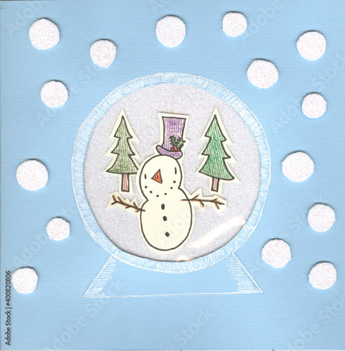 Happy Snowman in a glass ball