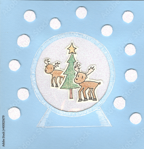 reindeer in a glass ball with snow