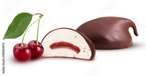 Chocolate candy bird's milk one cut in half with cherry filling photo