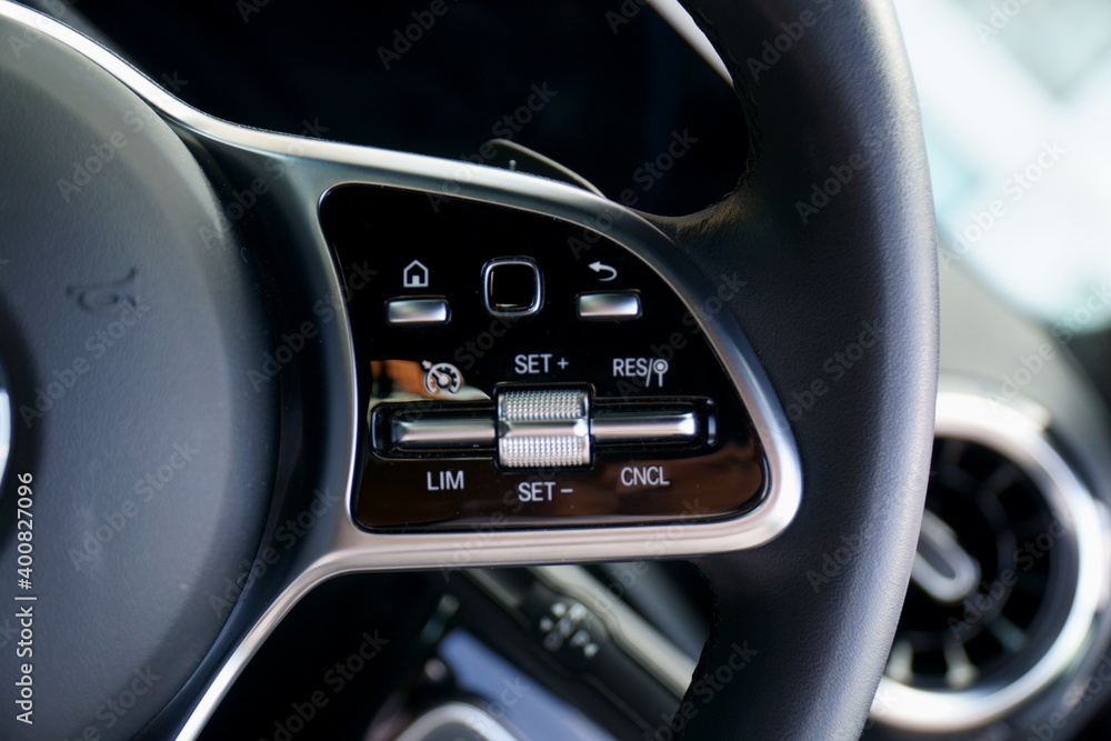 Steering wheel buttons on a modern luxury car