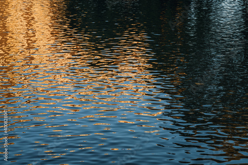 Light reflections on an urban pond