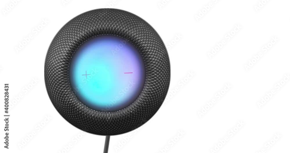 Top view of A smart speaker playing music on a black background Top view of A smart speaker playing music on a black background