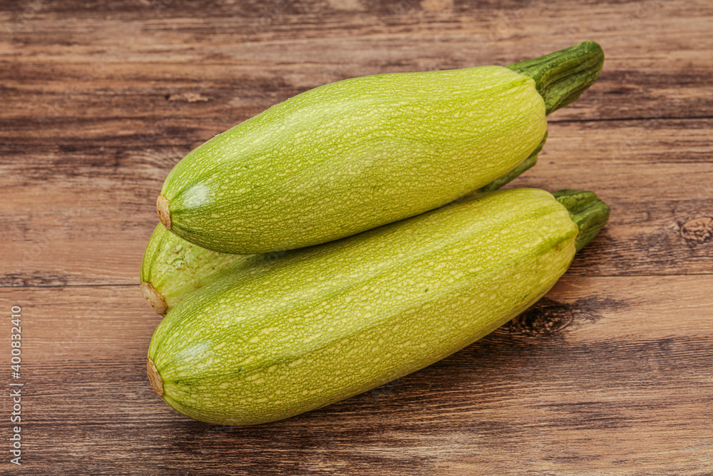 Young tasty zucchini over board Young tasty zucchini over board