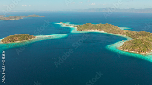 aerial seascape tropical beach with white sand and clear blue sea. tropical landscape with islands and beaches. Philippines, Palawan.