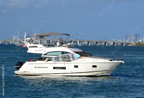 Fototapeta Naklejka Na Ścianę i Meble -  White motor yacht anchored in Biscayne Bay off Miami Beach,Florida.