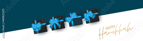 Happy Hanukkah. Traditional Jewish holiday. Chankkah banner or website header background design concept. Judaic religion decor with black luxury gift boxes with blue ribbon. Vector illustration. photo