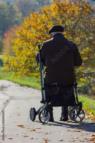 Wallpaper Mural senior man with rollator Torontodigital.ca