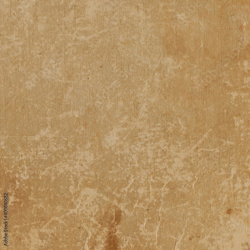 Vintage and old looking paper background. Retro cardboard texture. Grunge paper for drawing. Ancient book page.