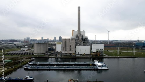 Coal central aerial drone shot chimney pipe energy recovery plant Hemweg in Amsterdam The Netherlands photo