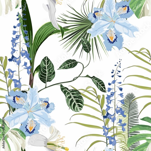 Tropical blue flowers and tropical leaves, light background. Seamless pattern. Jungle foliage illustration. Exotic plants. Summer beach floral design. Paradise nature.