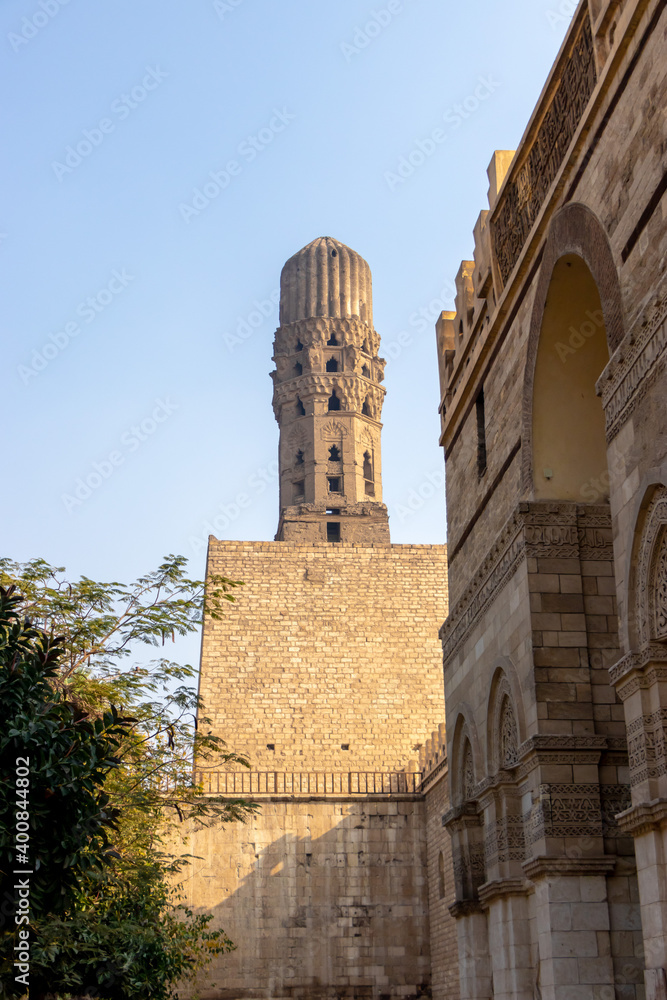 minaret of public historic Al Hakim Mosque known as the enlightened mosque located in Moez street, old Cairo, Egypt