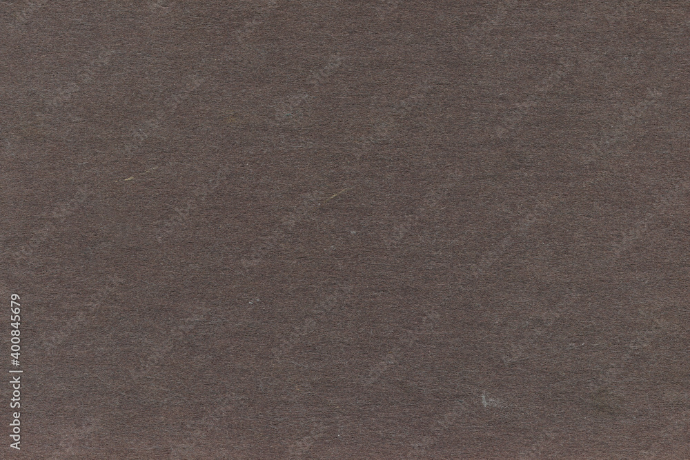 Fototapeta premium Vintage and old looking paper background. Retro cardboard texture. Grunge paper for drawing. Ancient book page.