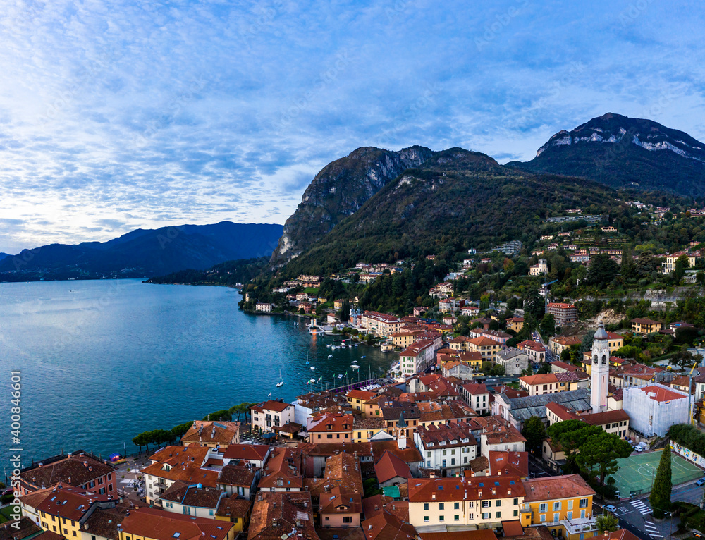 Italy, Province of Como, Menaggio, Helicopter view of town on shore of Lake Como at dawn Italy, Province of Como, Menaggio, Helicopter view of town on shore of Lake Como at dawn