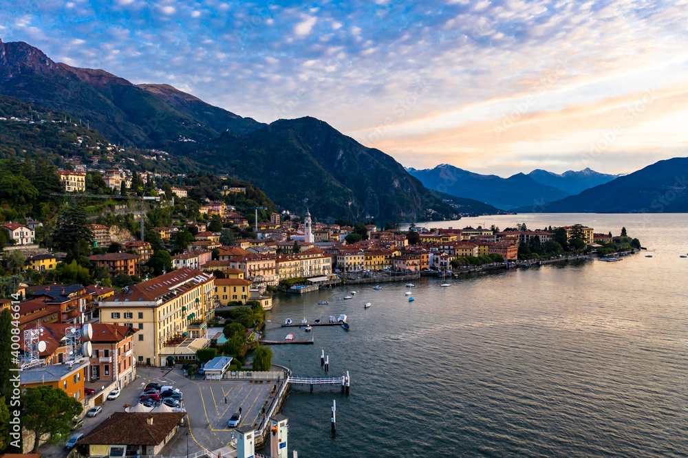 Italy, Province of Como, Menaggio, Helicopter view of town on shore of Lake Como at dawn Italy, Province of Como, Menaggio, Helicopter view of town on shore of Lake Como at dawn