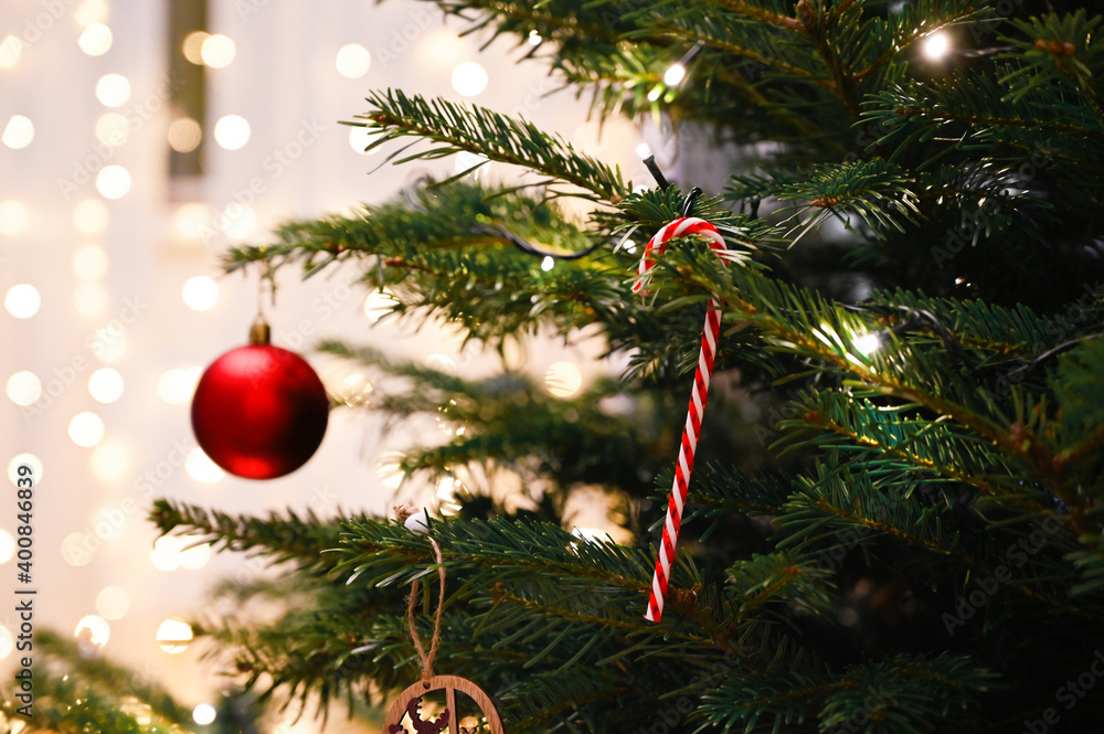 Christmas toys on the Christmas tree , close up. Holidays concept. Merry Christmas Christmas toys on the Christmas tree , close up. Holidays concept. Merry Christmas