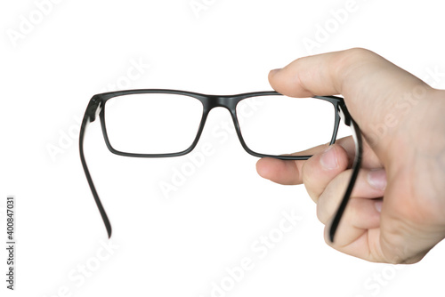 isolated on white person's hand holding a eyeglasses, mockup design, optical frame