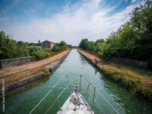France, Aisne, Bow of boat sailing along Canal De L'Oise A L'Aisne