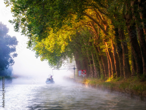 Boat on Canal entre Champagne et Bourgogne during foggy weather