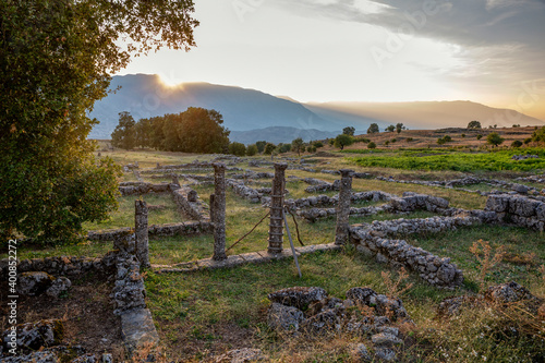 Albania,ÔøΩGjirokasterÔøΩCounty, Ruins of ancient Greek city ofÔøΩAntigoniaÔøΩat sunset