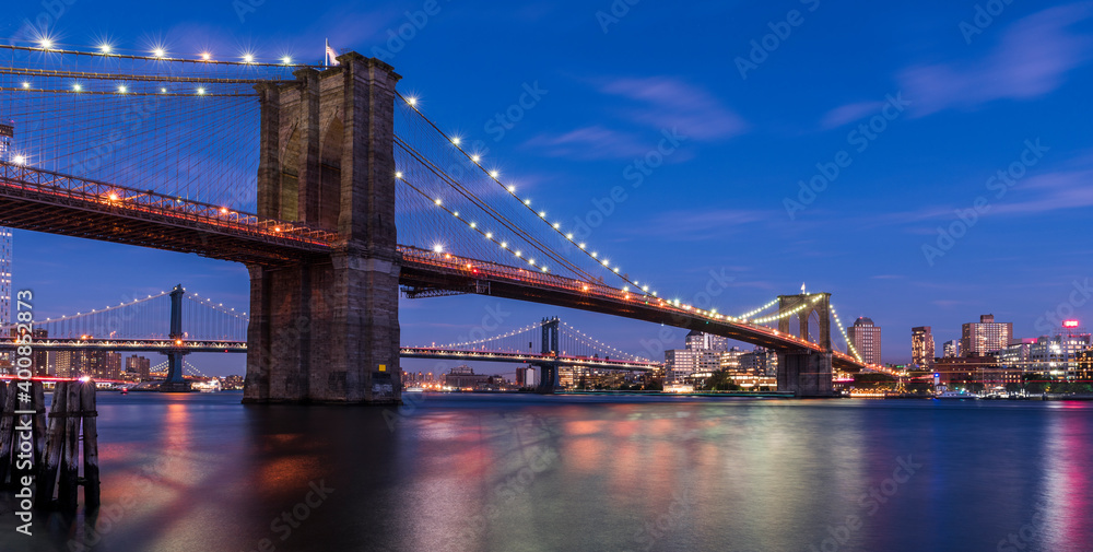 Brooklyn Bridge with skyscrapers background. New York.