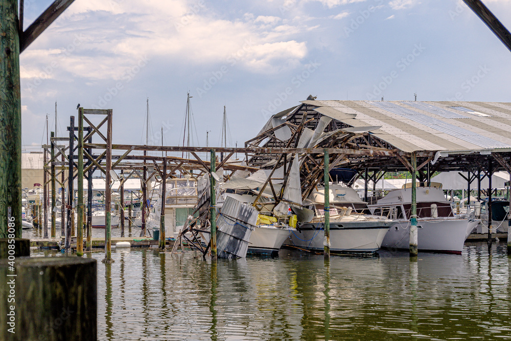Waterspout damage at marina to yachts, boats and sailboats