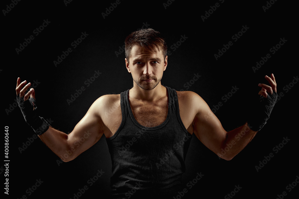 strong athletic bearded man on dark backgrround strong athletic bearded man on dark backgrround