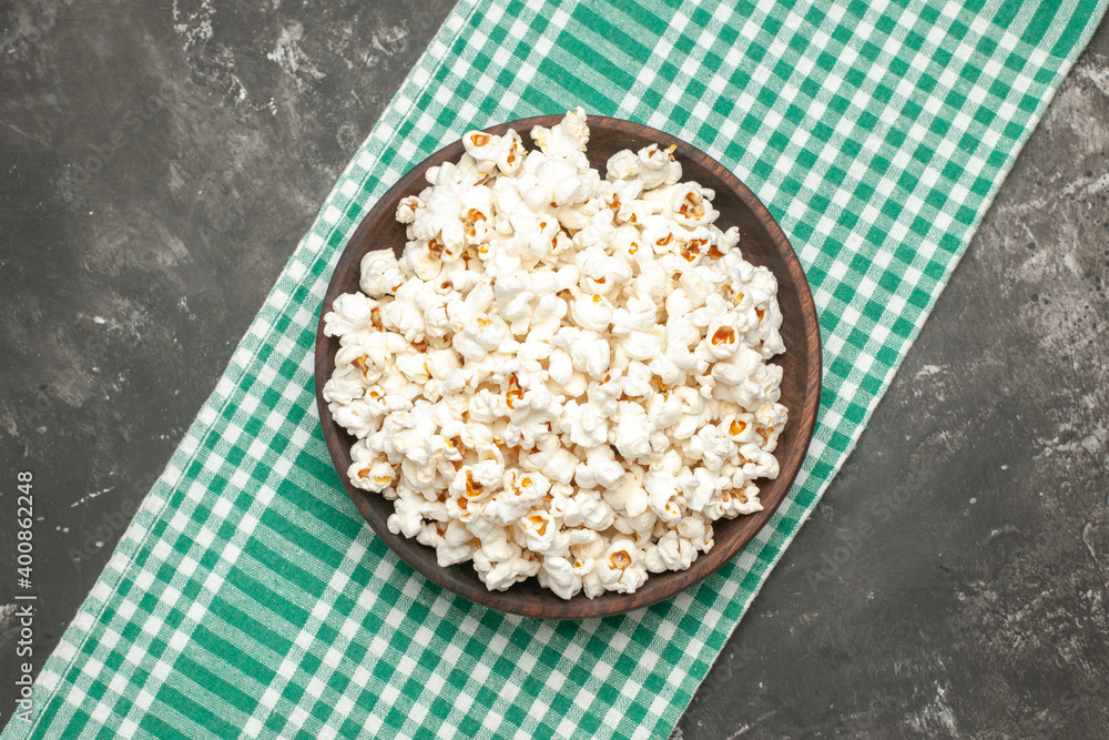 top view fresh popcorn on dark background darkness cinema movie color corn snack top view fresh popcorn on dark background darkness cinema movie color corn snack
