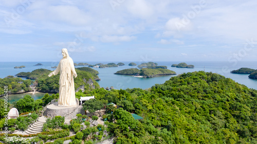 Statue of Jesus Christ on Pilgrimage island in Hundred Islands National Park, Pangasinan, Philippines. photo