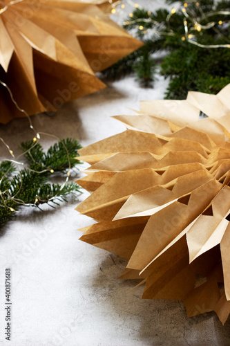 Paper Christmas stars made from craft bags. photo