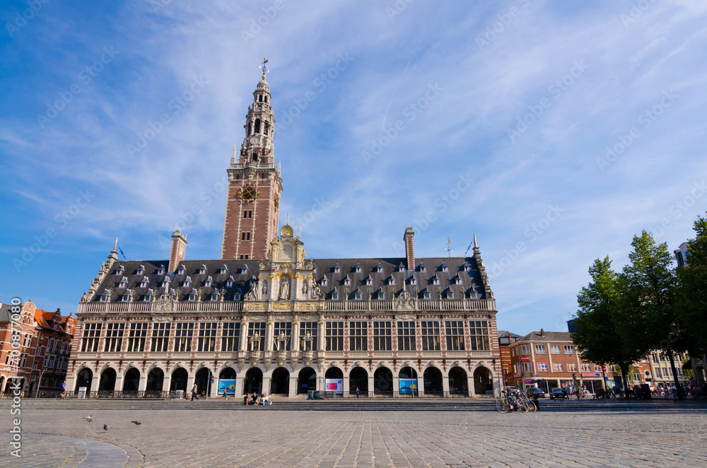 Leuven, Belgium, August 2019. Front view of the impressive university library, in Flemish Renaissance style. Beautiful sunny summer day.