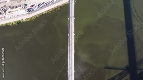 View of the pedestrian bridge over the river. Drone Video. Park near Teteriv River. Zhytomyr. Ukraine. Europe photo